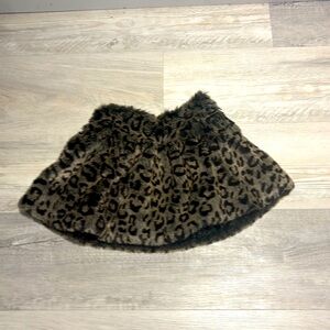 Leopard print faux-fur skirt.